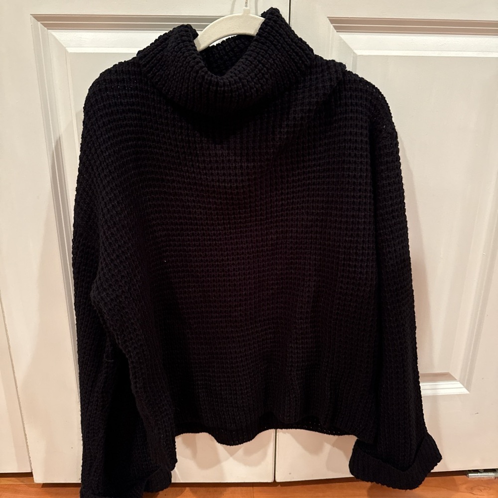 Black turtle neck sweater